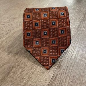 Tom James geometric tie orange